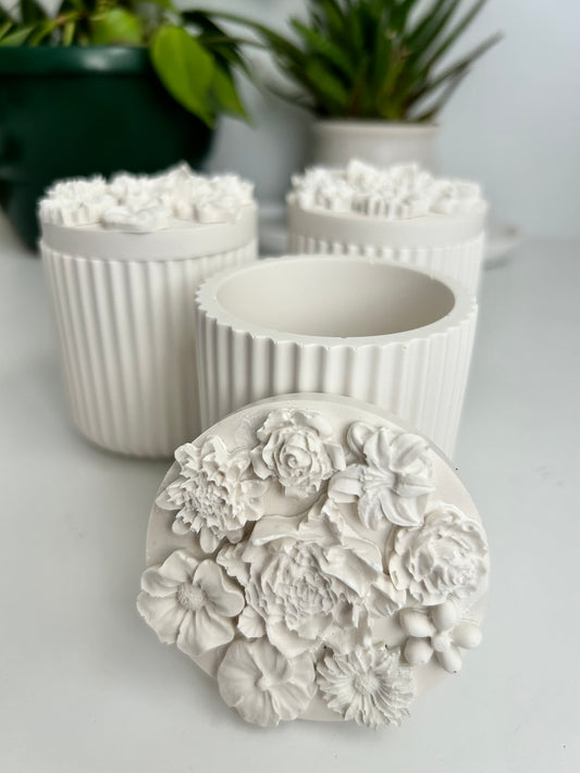 Floral candle containers