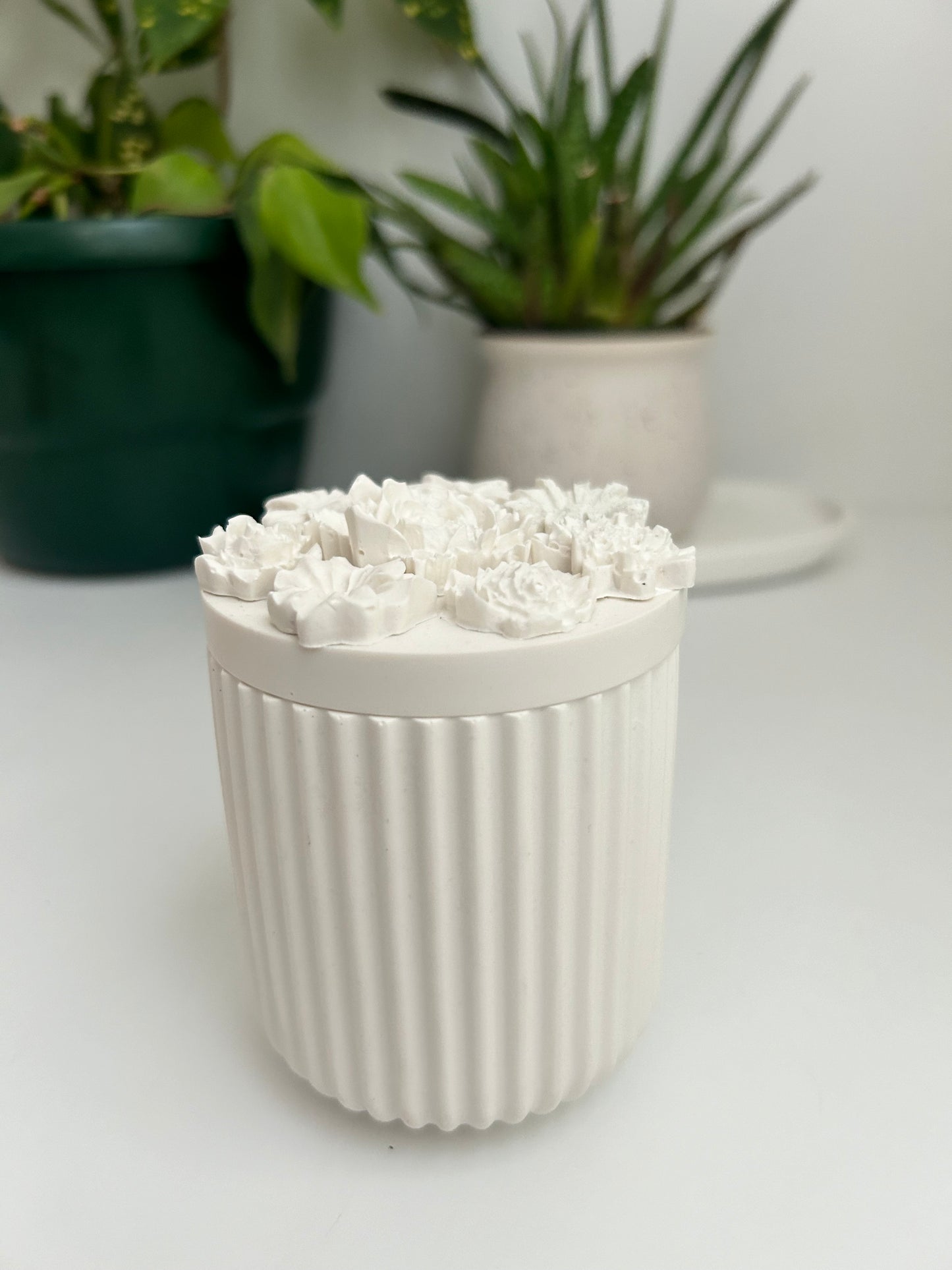 Floral candle containers