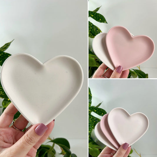 A pair of heart shaped trays