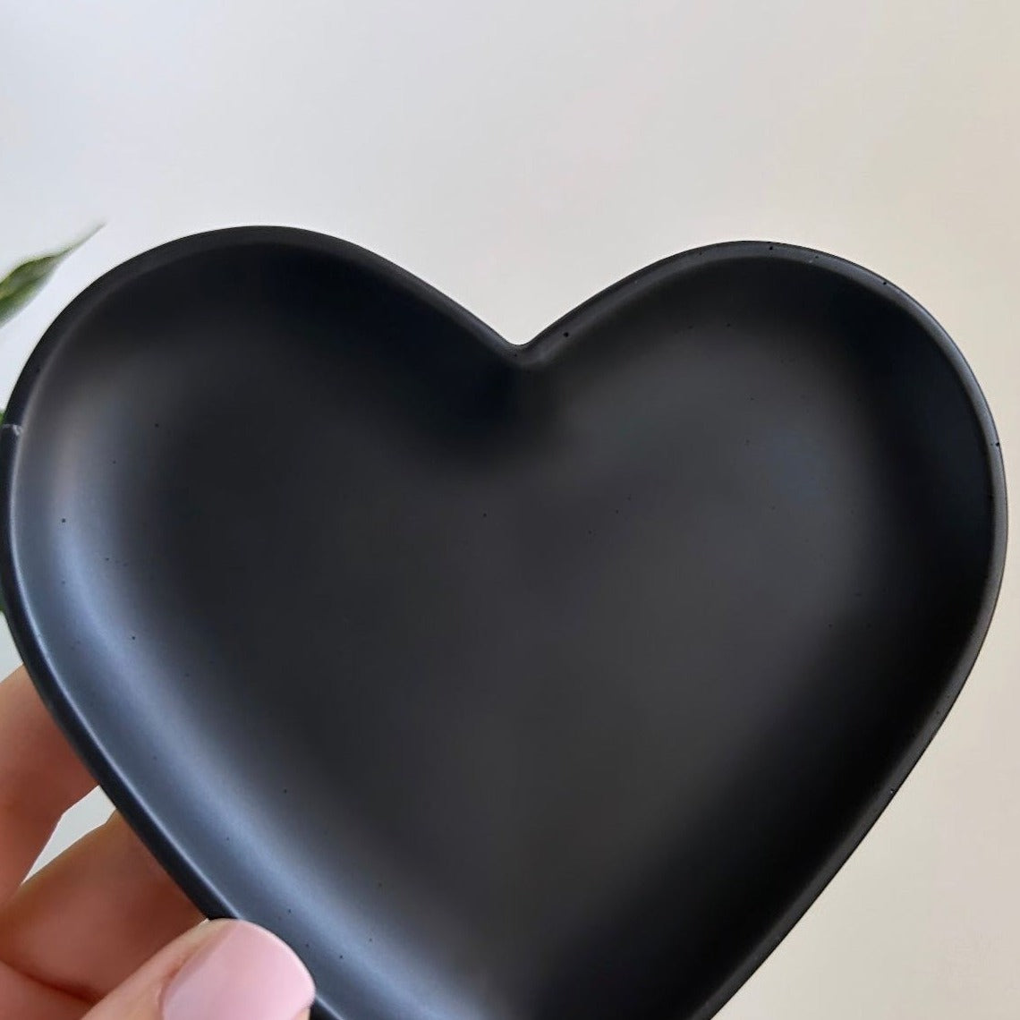 A pair of heart shaped trays