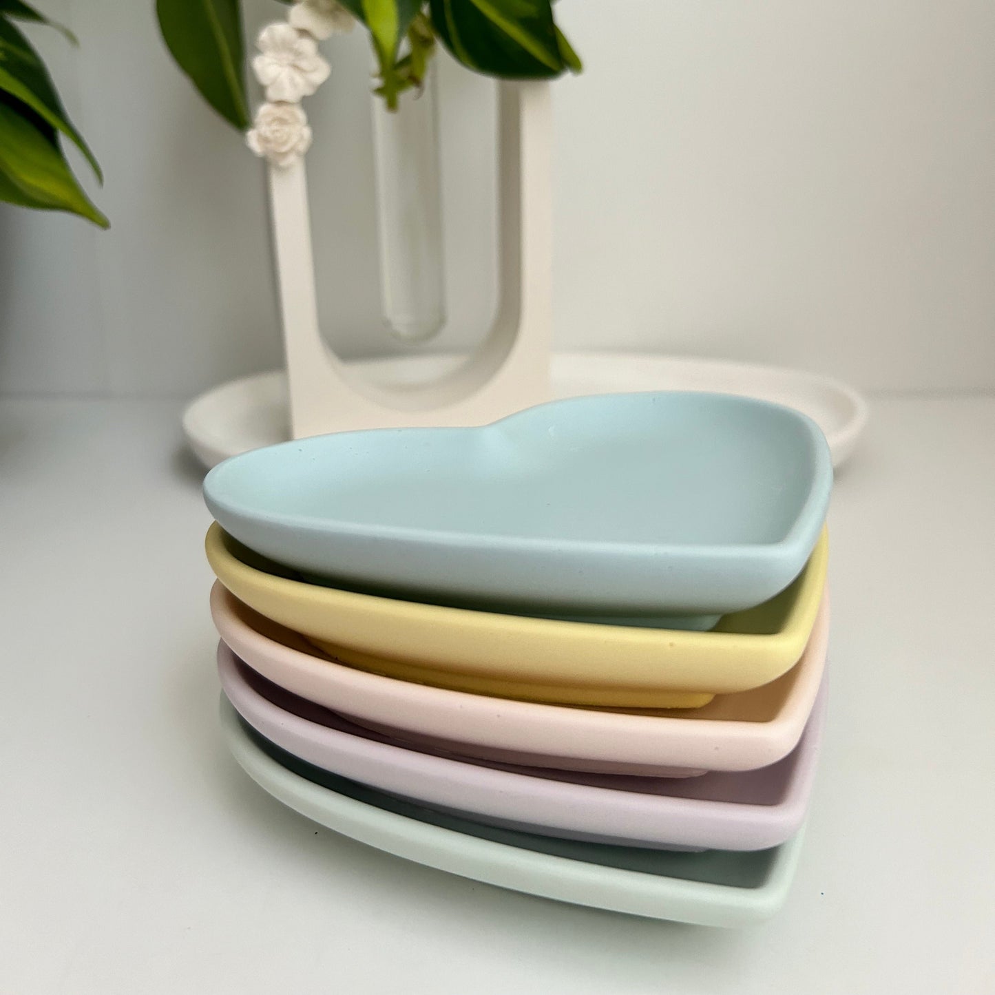 A pair of pastel heart trays