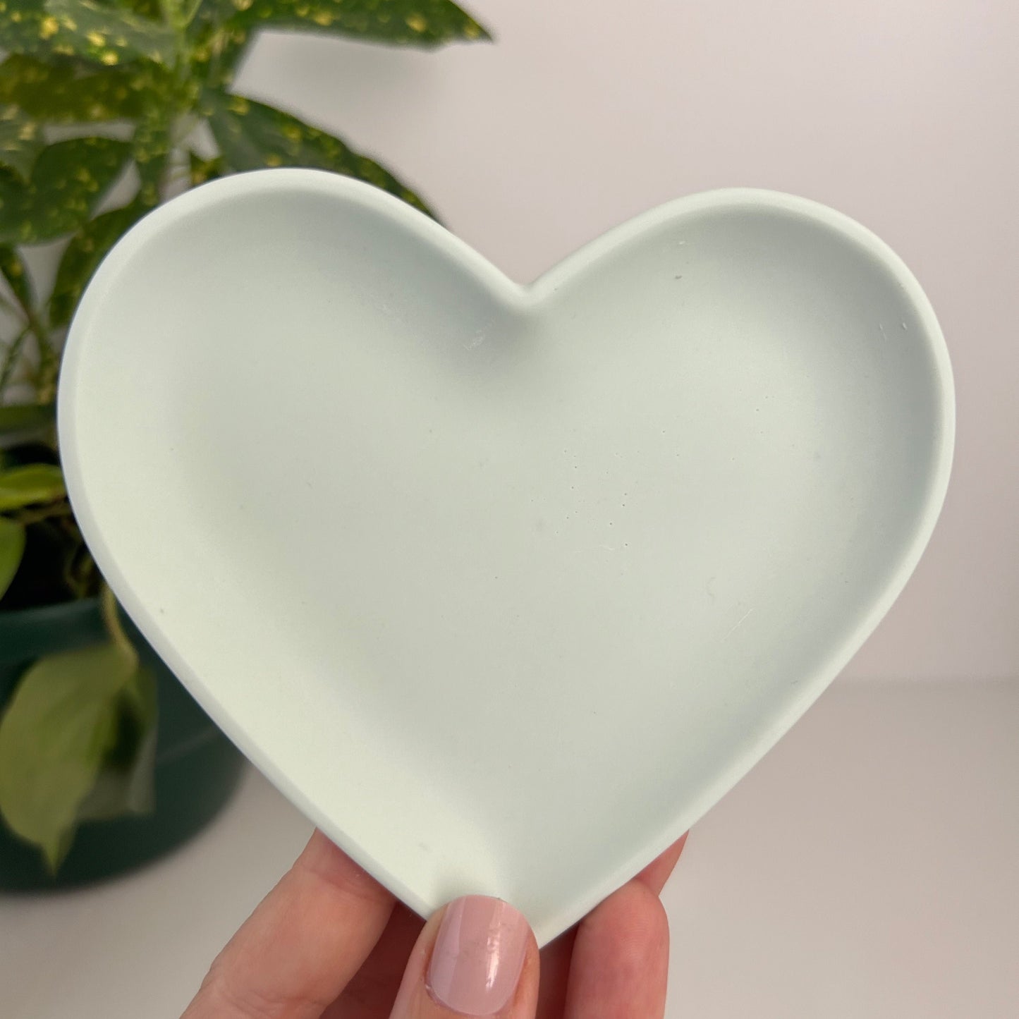 A pair of pastel heart trays